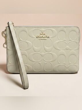 COACH Embossed Signature Wristlet - Light Cream